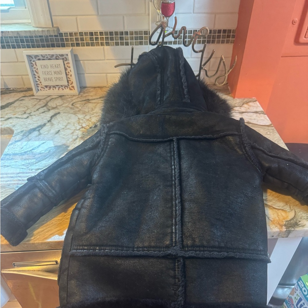 Black shearling Coat Very good coat for cold weather states. !!